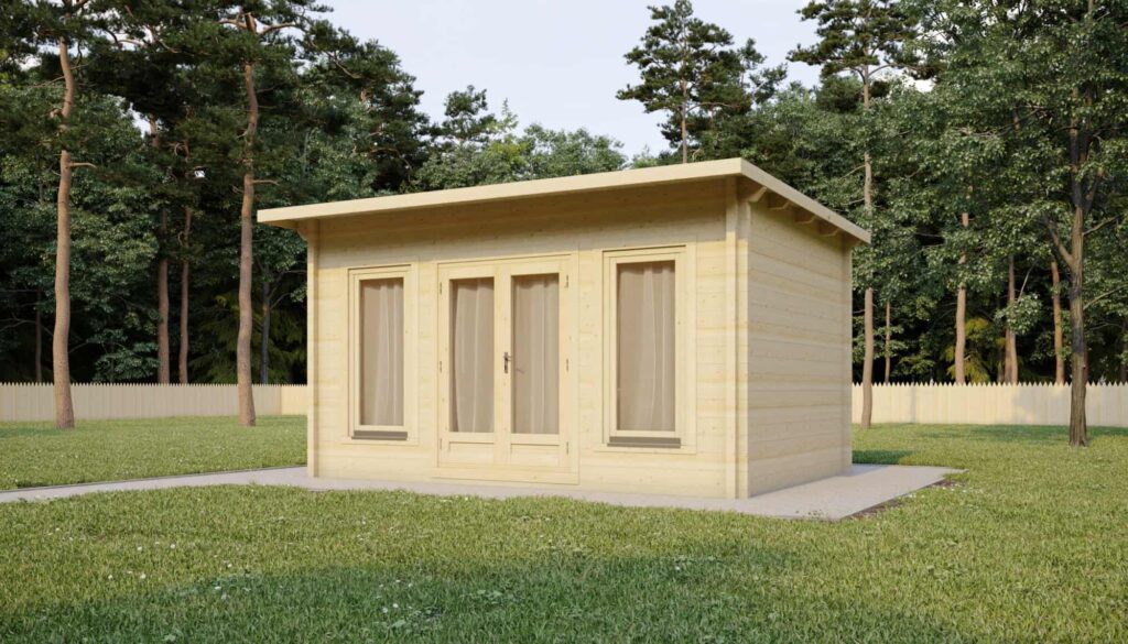 a small wooden building in a yard with trees in the background