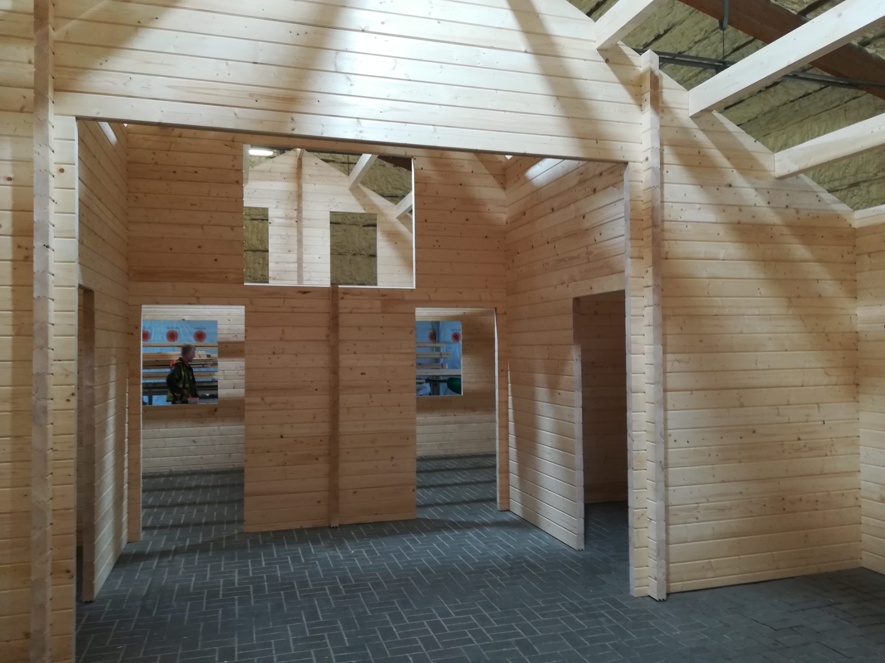 Internal partition walls of a timber building kit during assembly